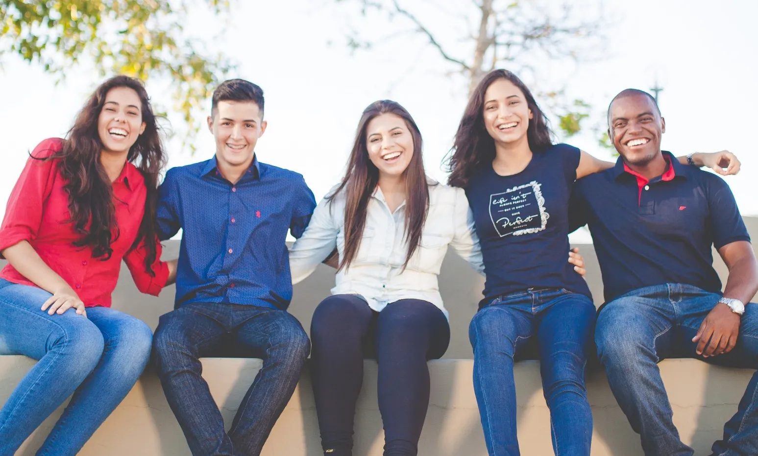 A group of friends smiling